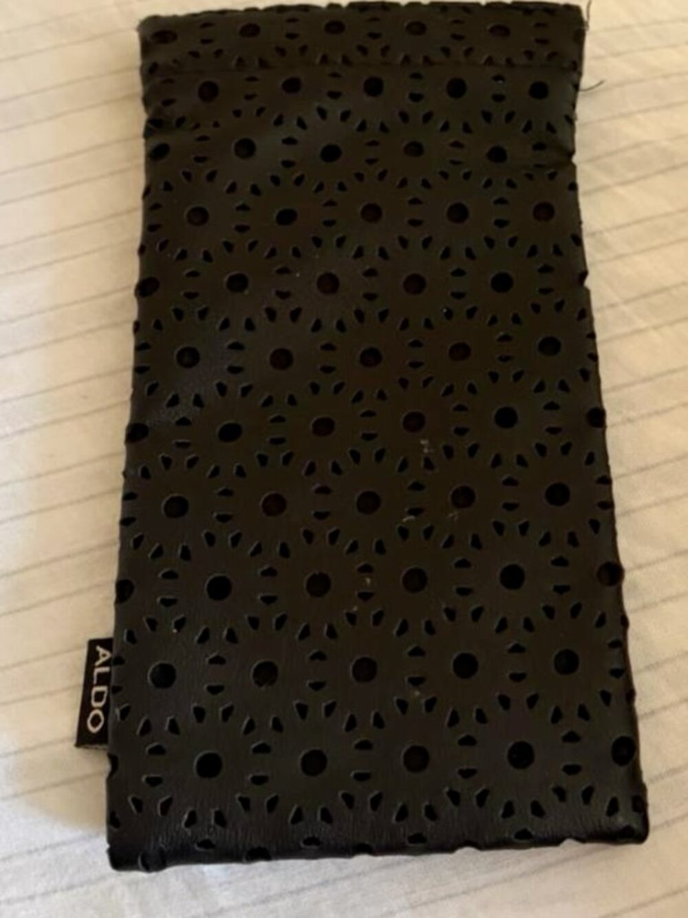 Aldo black laser-cut eyelet floral pattern glasses holder